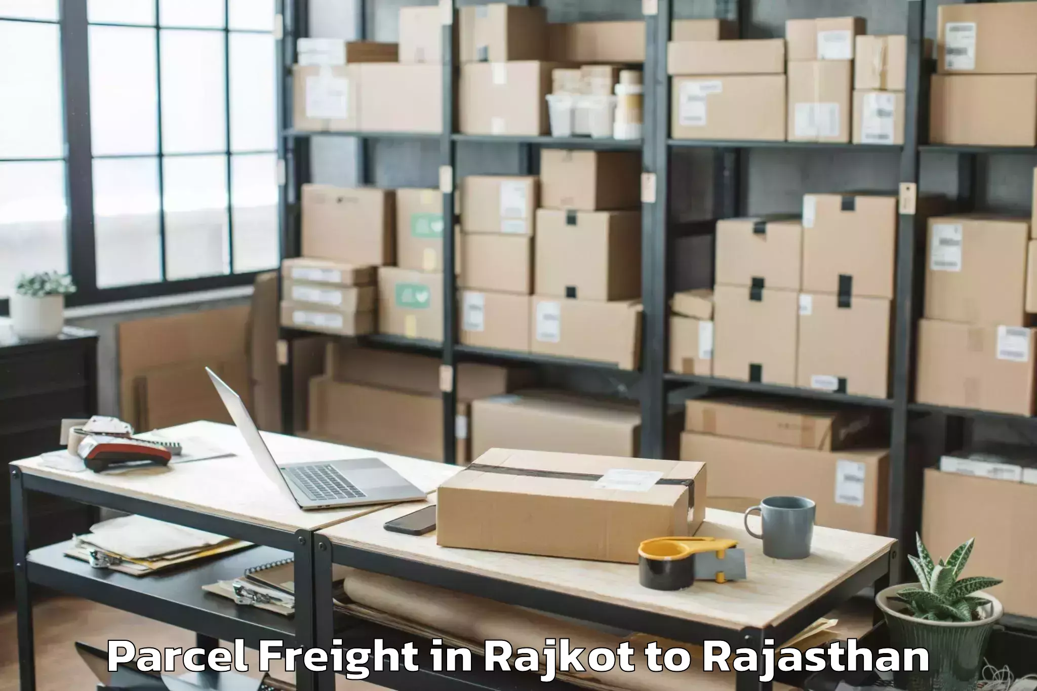 Leading Rajkot to Laxmangarh Parcel Freight Provider